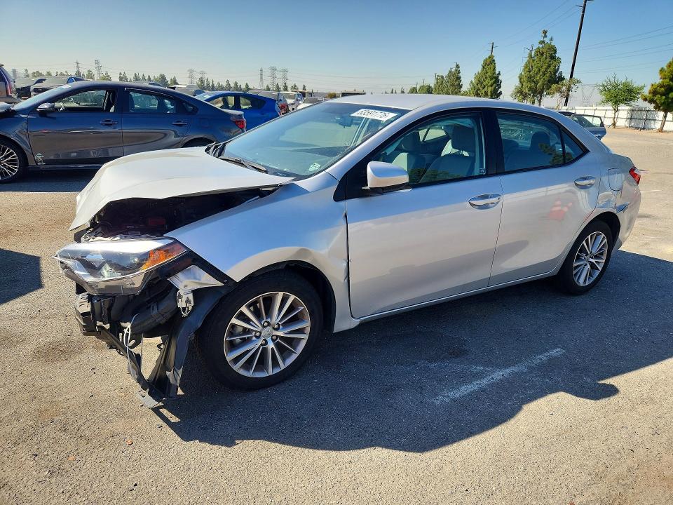 TOYOTA COROLLA 2015 with VIN 5YFBURHE2FP340945 - Photo from auction