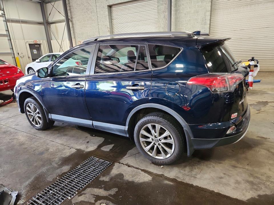 Photo 2 from auction – 2017 TOYOTA RAV4 with VIN 2T3DFREV7HW687851