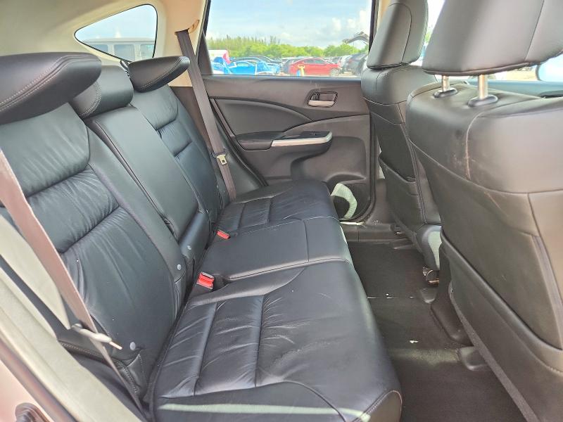 Photo 11 from auction – 2013 HONDA CR-V with VIN 2HKRM4H75DH608352