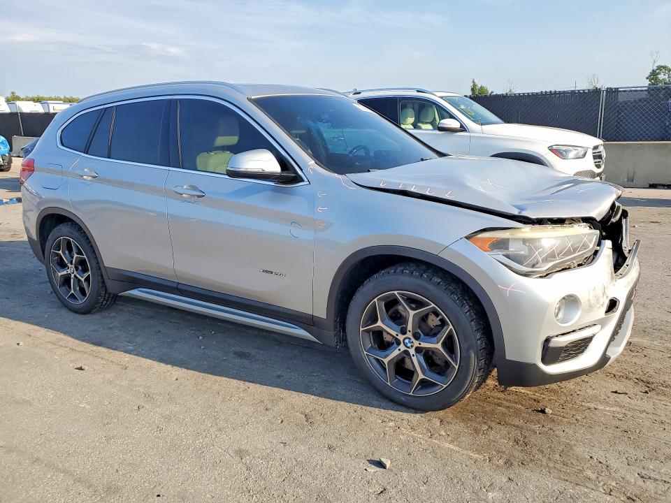 Photo 4 from auction – 2017 BMW X1 with VIN WBXHT3Z39H4A54450