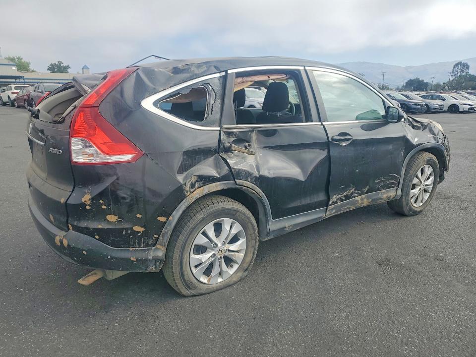 Photo 3 from auction – 2014 HONDA CR-V with VIN 5J6RM4H59EL000145