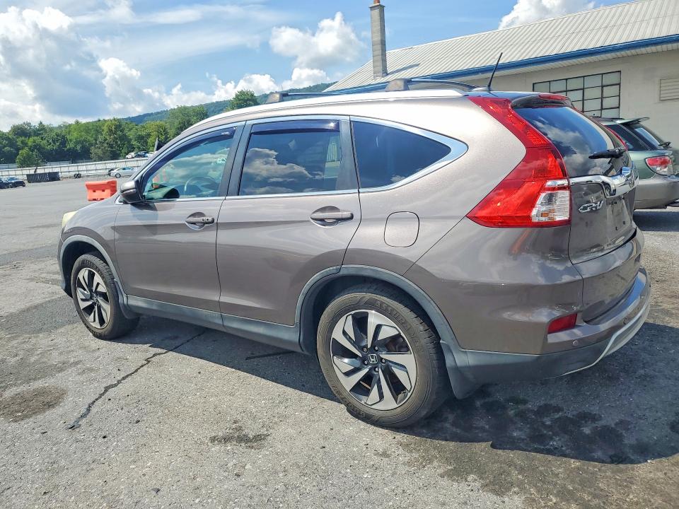 Photo 2 from auction – 2015 HONDA CR-V with VIN 5J6RM4H94FL041898