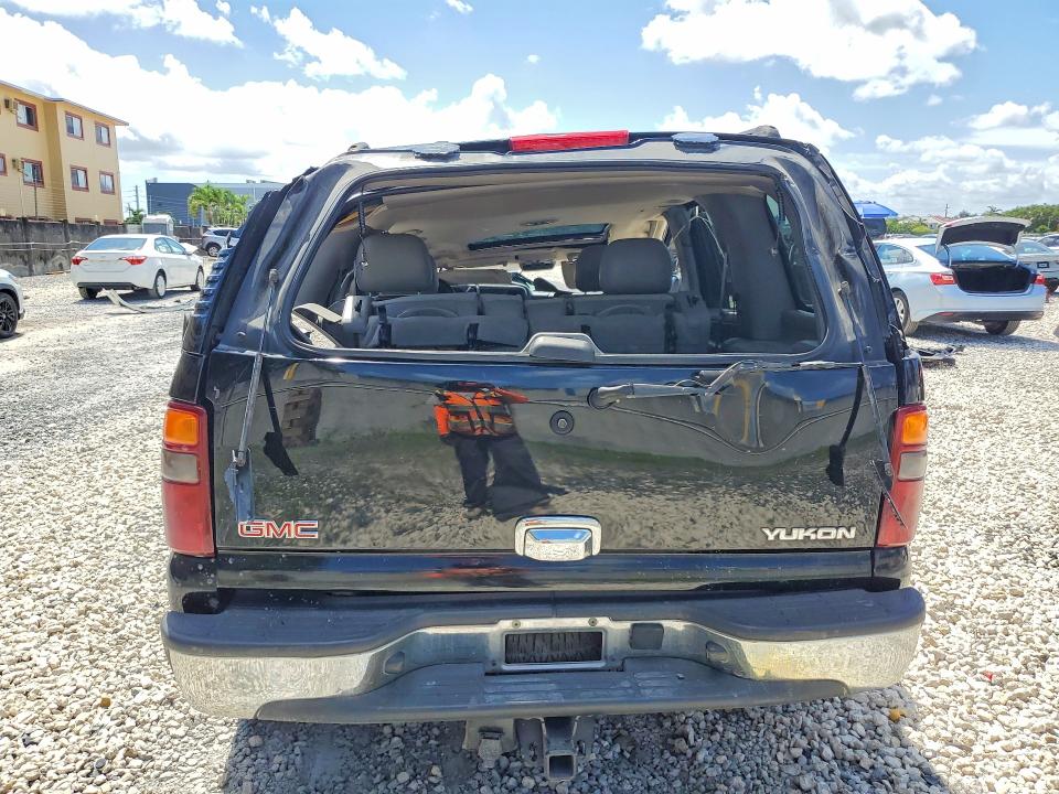 Photo 6 from auction – 2003 GMC YUKON with VIN 1GKEC13Z63R229204