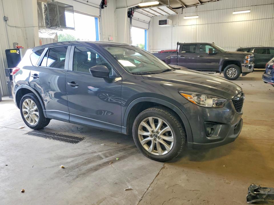Photo 4 from auction – 2014 MAZDA CX-5 with VIN JM3KE4DY4E0348495