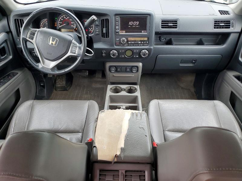 Photo 8 from auction – 2011 HONDA RIDGELINE with VIN 5FPYK1F52BB003841