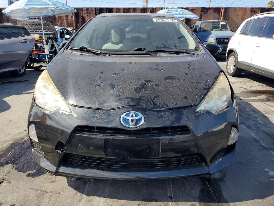 Photo 5 from auction – 2013 TOYOTA PRIUS C with VIN JTDKDTB32D1550872