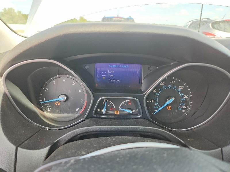Photo 9 from auction – 2014 FORD FOCUS with VIN 1FADP3F29EL107454