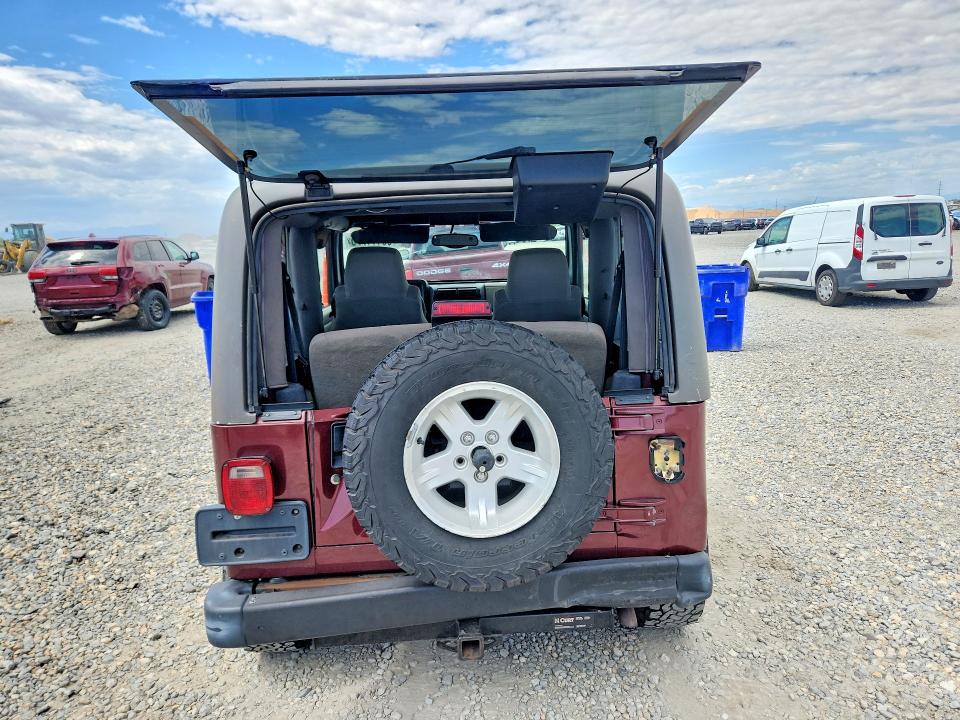 Photo 6 from auction – 2004 JEEP WRANGLER / TJ with VIN 1J4FA59S84P703457