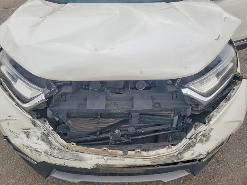 Photo 12 from auction – 2017 HONDA CR-V with VIN 2HKRW2H93HH629481