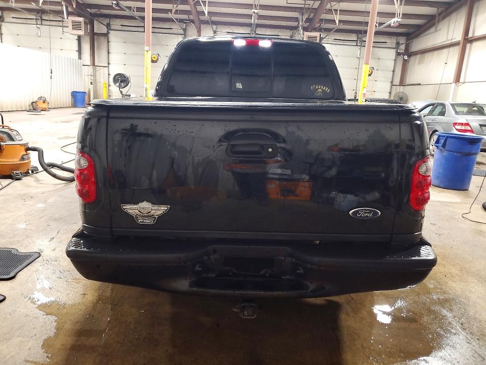 Photo 6 from auction – 2003 FORD F150 with VIN 1FTRW07333KC82259