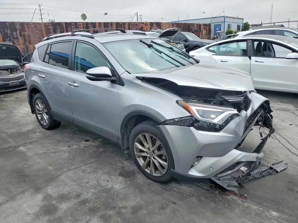 Photo 4 from auction – 2016 TOYOTA RAV4 with VIN 2T3YFREV2GW311932