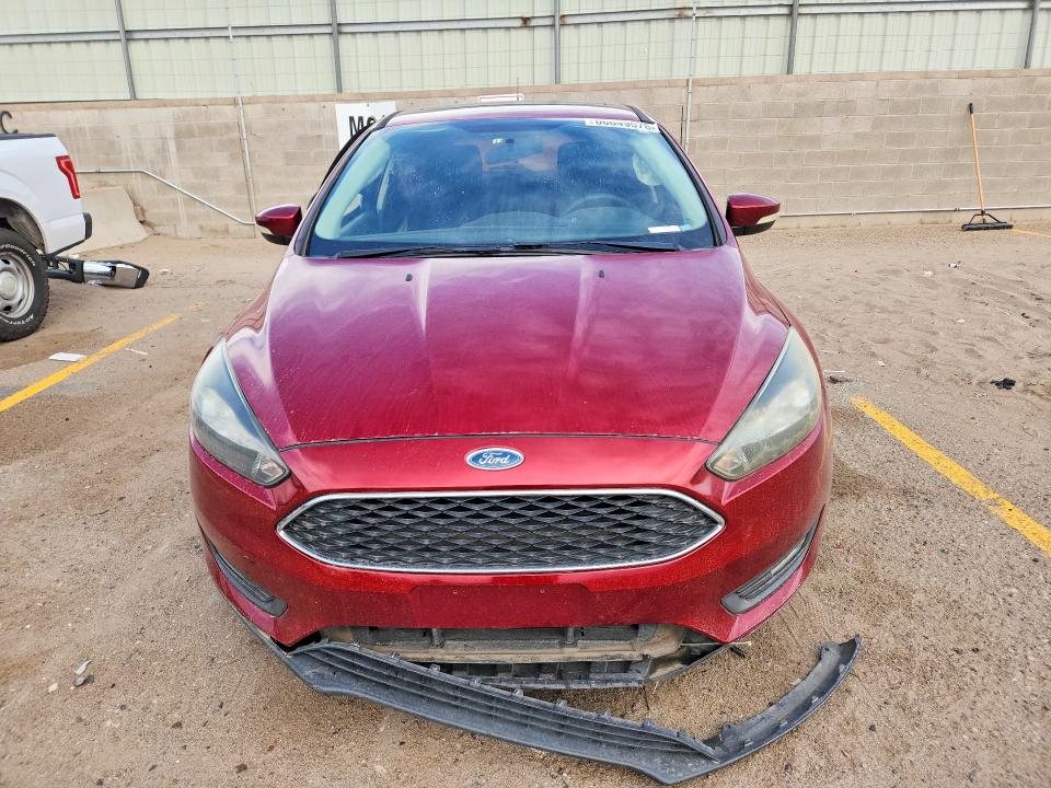 Foto 5 de la subasta – 2017 FORD FOCUS con VIN 1FADP3M28HL219637