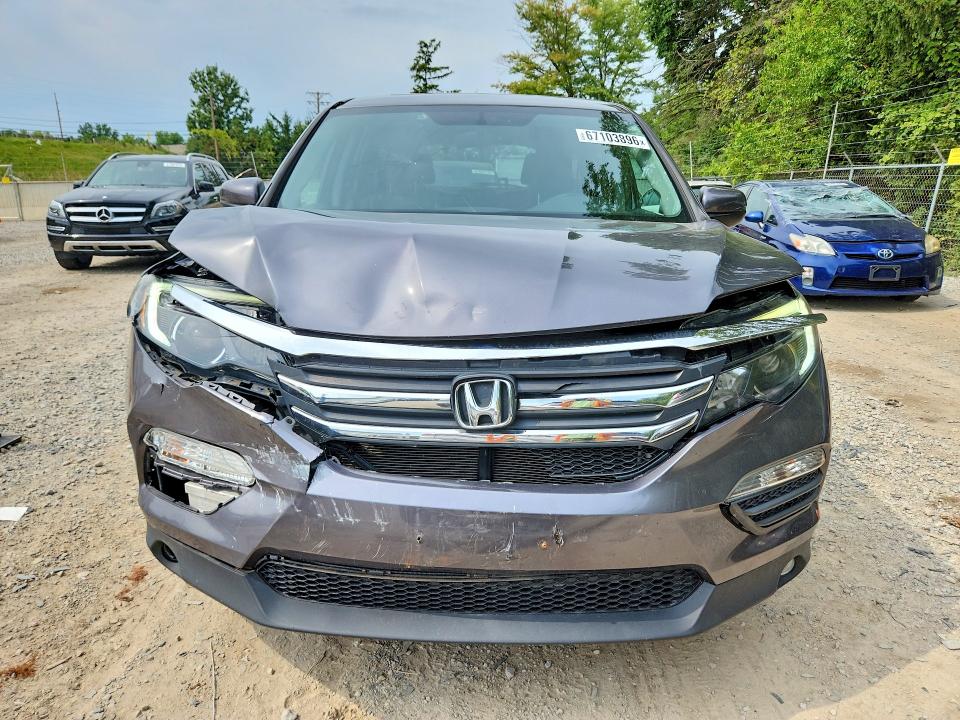 Photo 5 from auction – 2016 HONDA PILOT with VIN 5FNYF6H57GB004160
