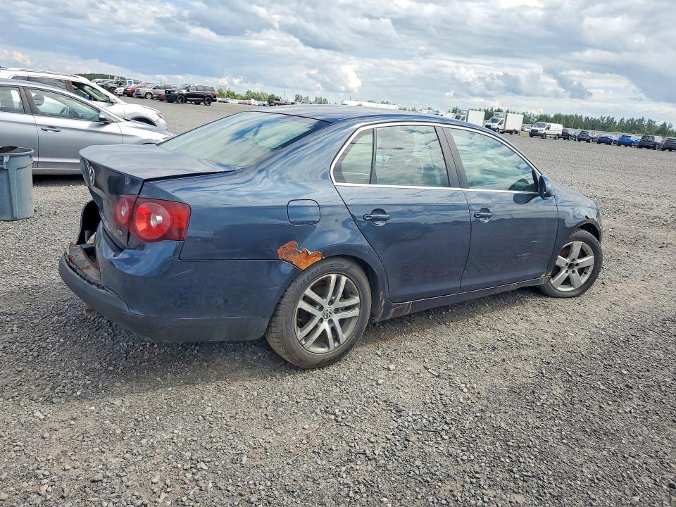 Photo 3 from auction – 2009 VOLKSWAGEN JETTA with VIN 3VWHM71K69M035472