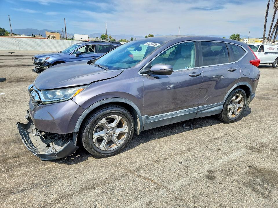 Photo 1 from auction – 2017 HONDA CR-V with VIN 7FARW1H80HE030008