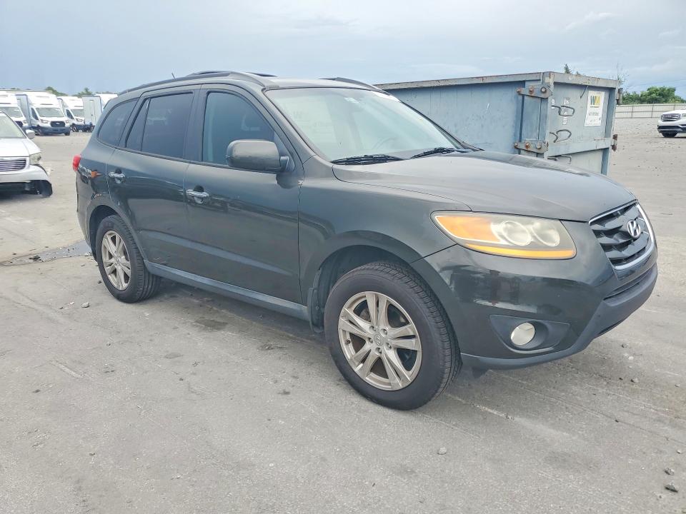 Photo 4 from auction – 2011 HYUNDAI SANTA FE with VIN 5XYZK3AB5BG044124