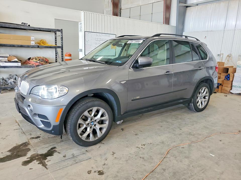BMW X5 2013 with VIN 5UXZV4C50D0B13512 - Photo from auction