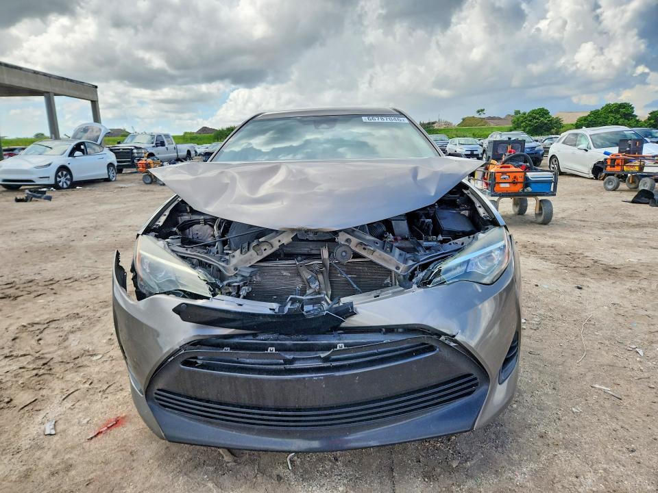 Photo 5 from auction – 2017 TOYOTA COROLLA with VIN 5YFBURHE8HP651380