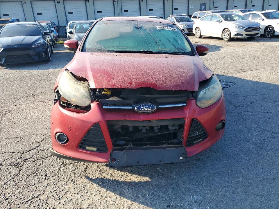 Foto 5 de la subasta – 2012 FORD FOCUS con VIN 1FAHP3J29CL167076