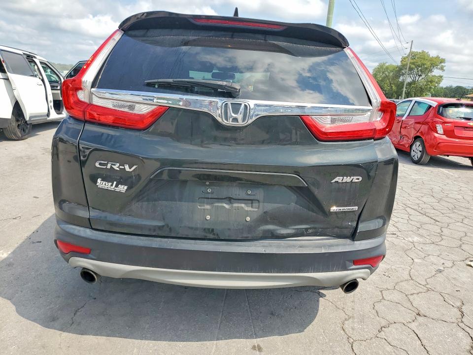 Photo 6 from auction – 2018 HONDA CR-V with VIN 7FARW2H90JE038209