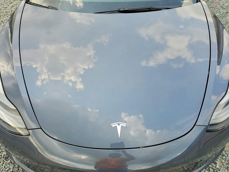 Photo 11 from auction – 2022 TESLA MODEL 3 with VIN 5YJ3E1EC9NF268027