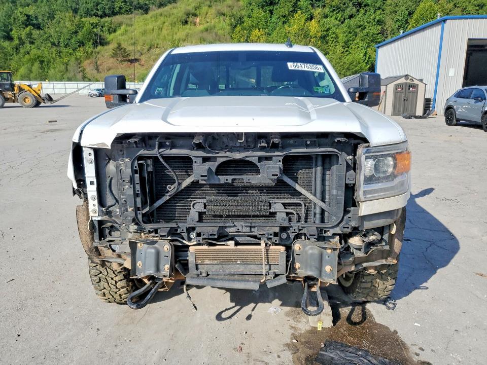 Photo 5 from auction – 2016 GMC SIERRA with VIN 1GT22SEG3GZ357344