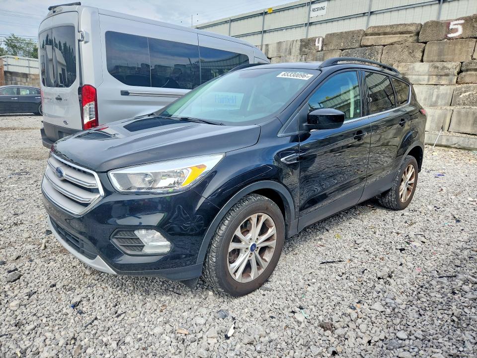 FORD ESCAPE 2018 with VIN 1FMCU9GD1JUC61531 - Photo from auction