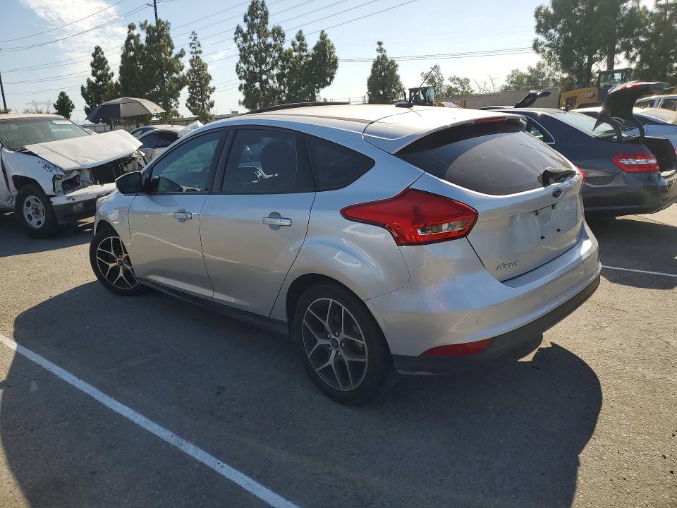 Снимка 2 от търг – 2017 FORD FOCUS с VIN 1FADP3M21HL290419