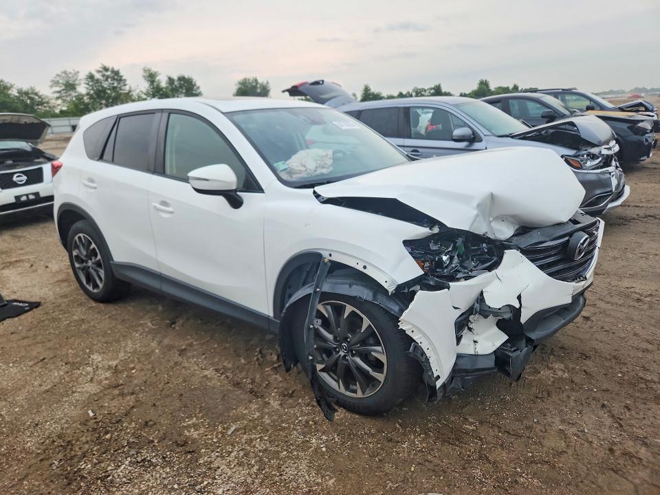 Photo 4 from auction – 2016 MAZDA CX-5 with VIN JM3KE4DY9G0668835