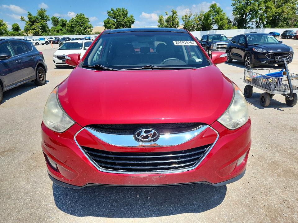 Photo 5 from auction – 2013 HYUNDAI TUCSON with VIN KM8JUCAC5DU712808
