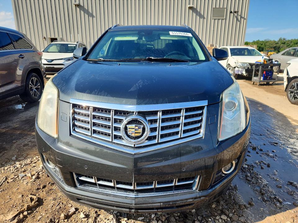 Photo 5 from auction – 2014 CADILLAC SRX with VIN 3GYFNDE31ES685173