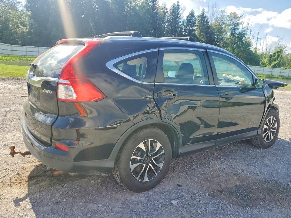 Photo 3 from auction – 2015 HONDA CR-V with VIN 5J6RM4H39FL049247