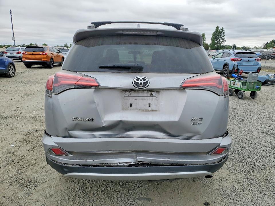 Photo 6 from auction – 2016 TOYOTA RAV4 with VIN 2T3RFREV0GW526911