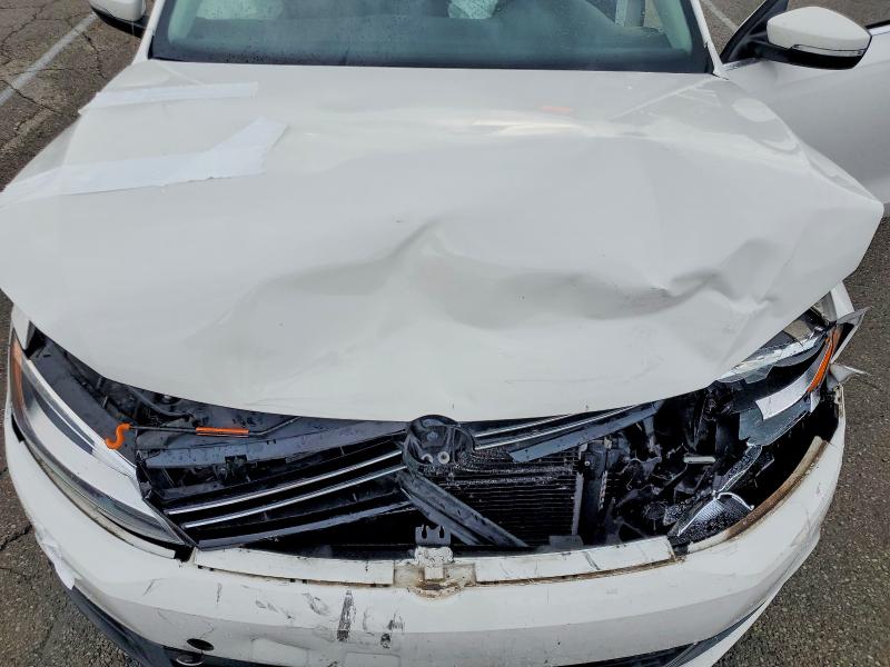 Photo 11 from auction – 2014 VOLKSWAGEN JETTA with VIN 3VWD17AJ5EM369050
