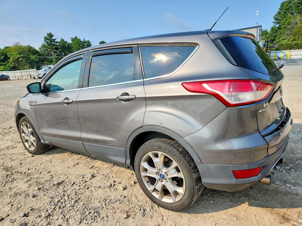 Photo 2 from auction – 2013 FORD ESCAPE with VIN 1FMCU9H96DUC90294