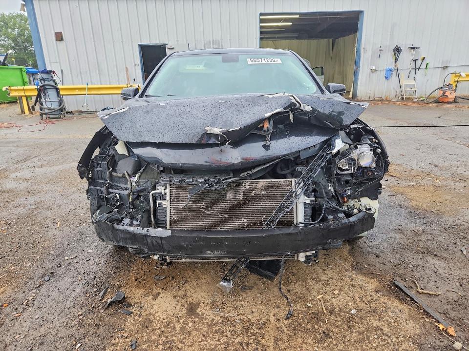 Photo 5 from auction – 2015 CHEVROLET MALIBU with VIN 1G11C5SL8FF340981