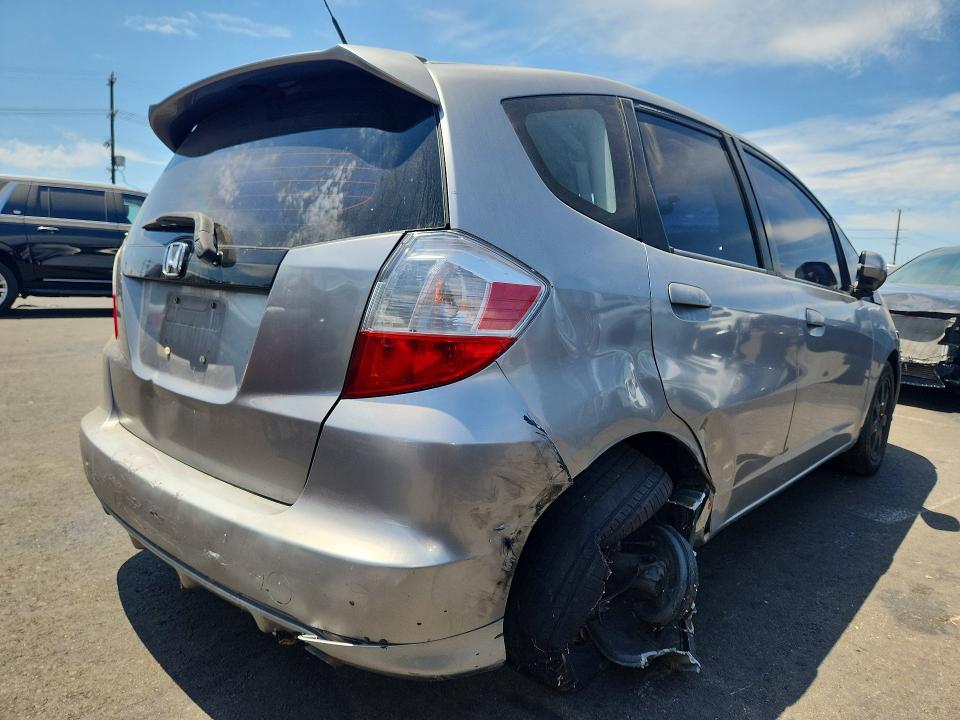 Photo 3 from auction – 2009 HONDA FIT with VIN JHMGE88459S013719