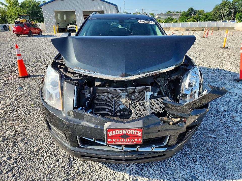 Photo 5 from auction – 2015 CADILLAC SRX with VIN 3GYFNEE3XFS511092