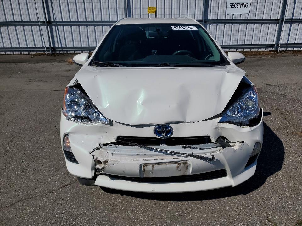 Photo 5 from auction – 2013 TOYOTA PRIUS C with VIN JTDKDTB37D1533100