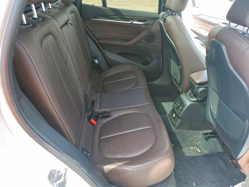 Photo 11 from auction – 2017 BMW X1 with VIN WBXHT3Z35H4A65557