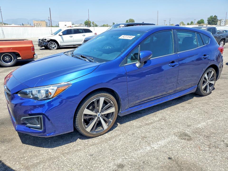 SUBARU IMPREZA 2017 with VIN 4S3GTAK66H3738635 - Photo from auction