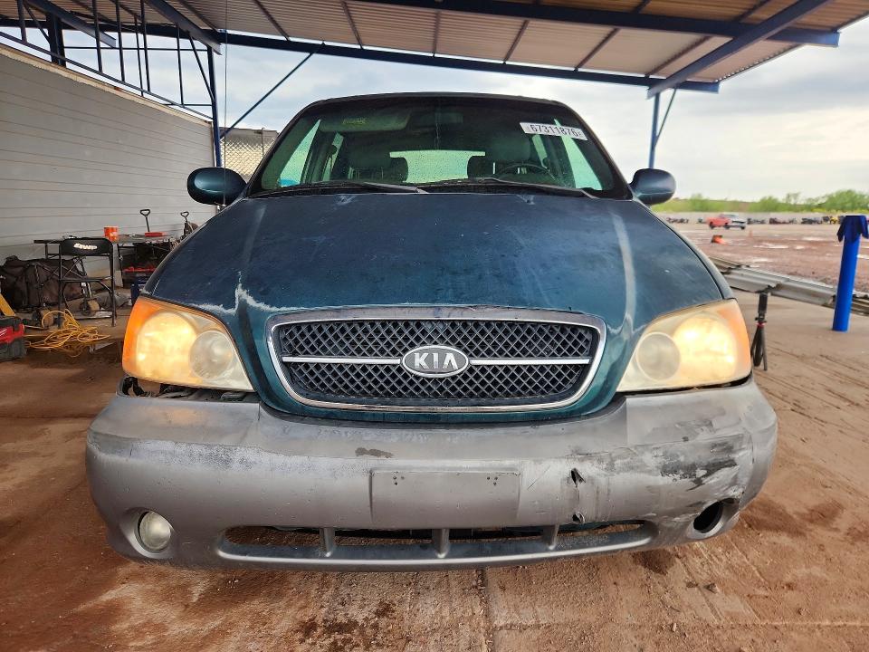 Photo 5 from auction – 2004 KIA SEDONA with VIN KNDUP131546595390