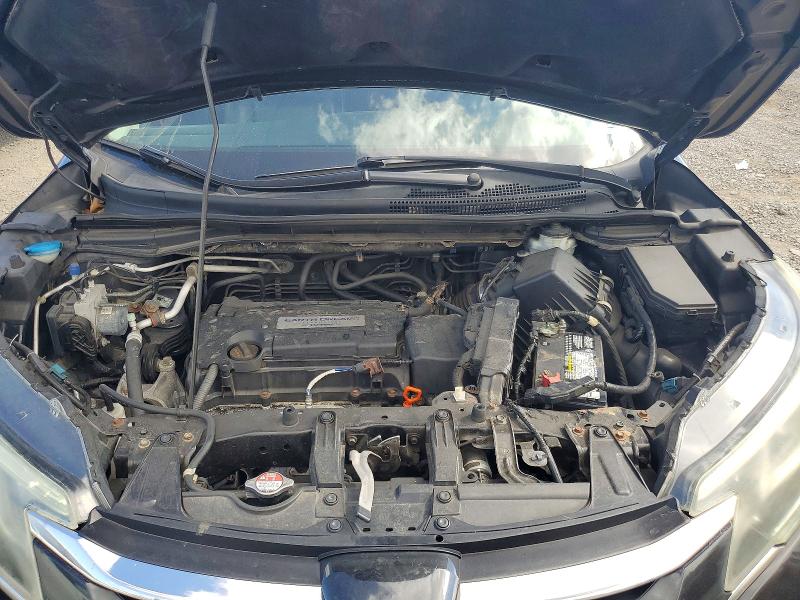 Photo 12 from auction – 2015 HONDA CR-V with VIN 5J6RM4H90FL093304