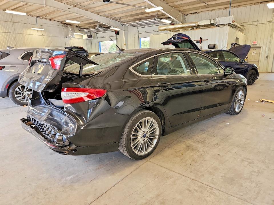 Photo 3 from auction – 2015 FORD FUSION with VIN 3FA6P0T98FR310752