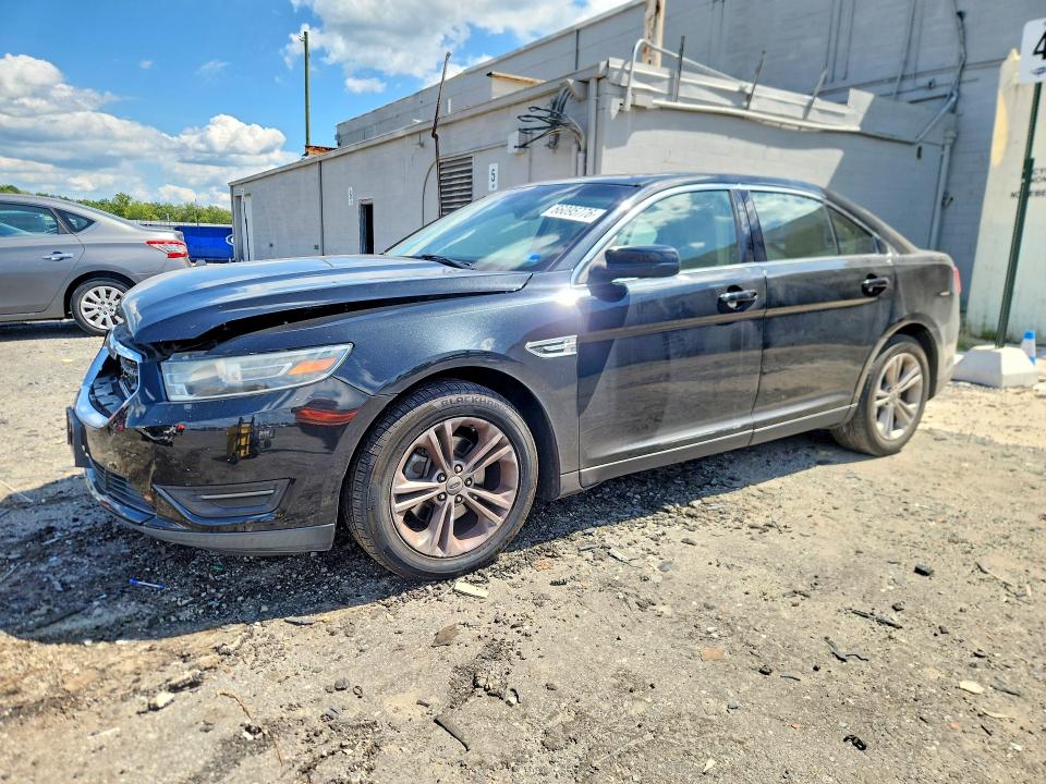 FORD TAURUS 2015 with VIN 1FAHP2E87FG162450 - Photo from auction