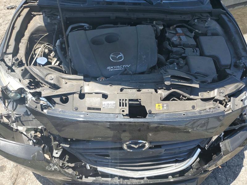 Photo 11 from auction – 2015 MAZDA 3 with VIN 3MZBM1L72FM225969