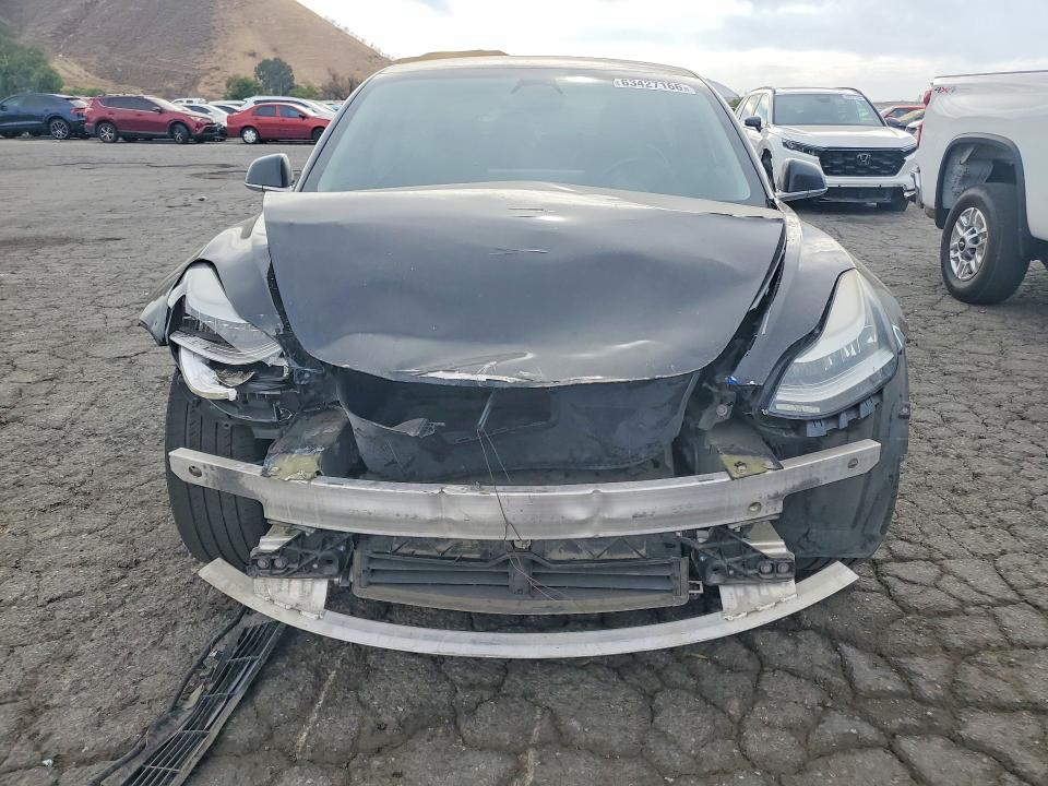 Photo 5 from auction – 2018 TESLA MODEL 3 with VIN 5YJ3E1EA4JF034385