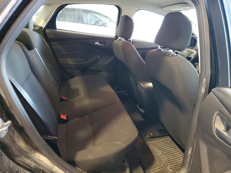 Снимка 10 от търг – 2016 FORD FOCUS с VIN 1FADP3F24GL230033