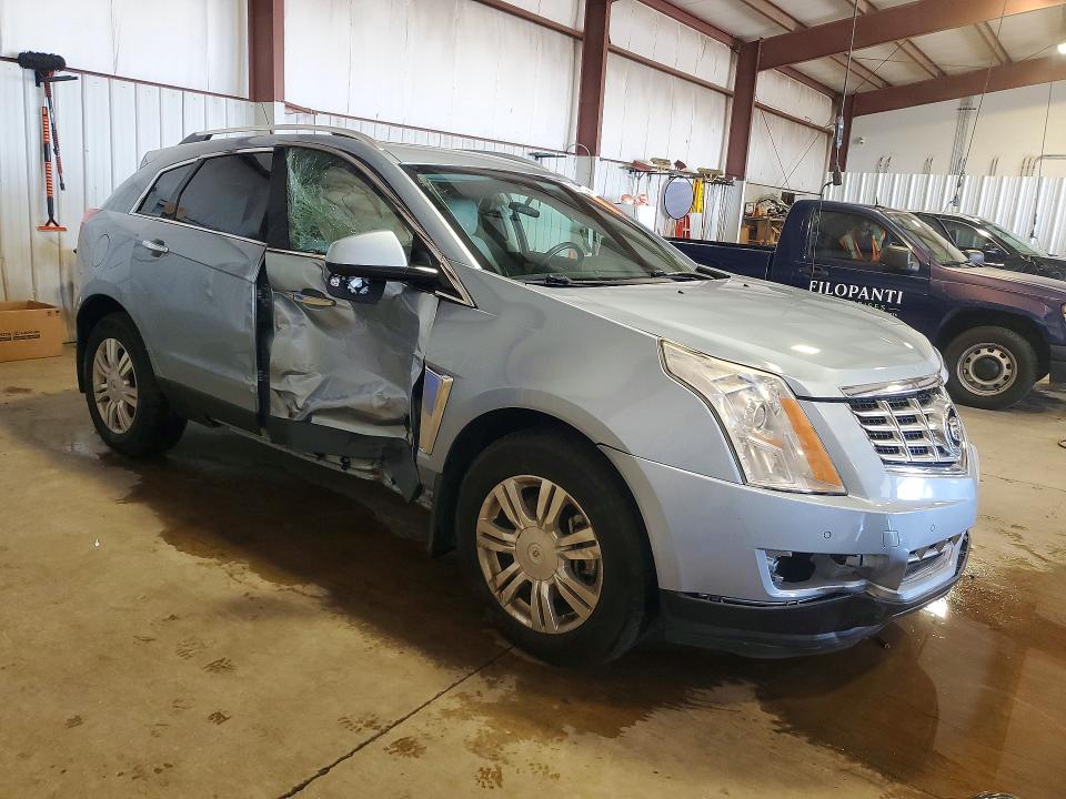 Photo 4 from auction – 2014 CADILLAC SRX with VIN 3GYFNEE34ES592587