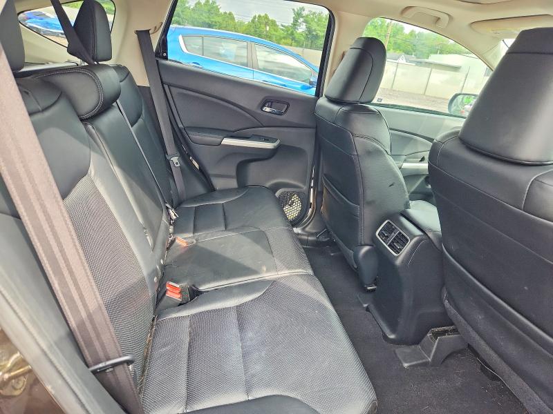 Photo 11 from auction – 2016 HONDA CR-V with VIN 2HKRM4H75GH724672